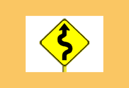 Winding road warning sign